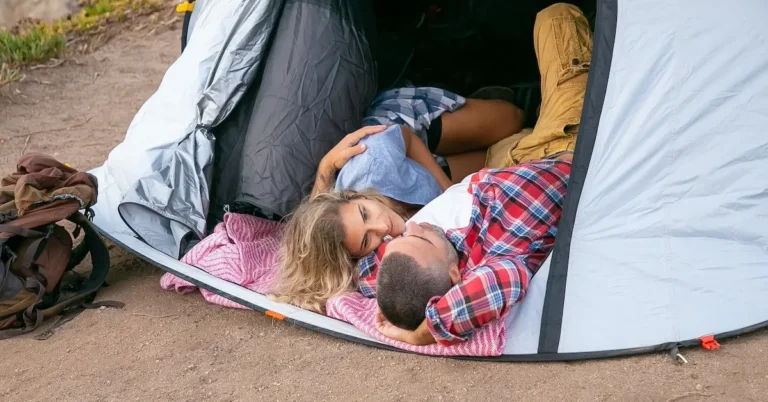 camping couple lying in tent ideas